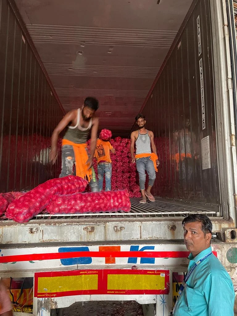 AMGS loading team at container